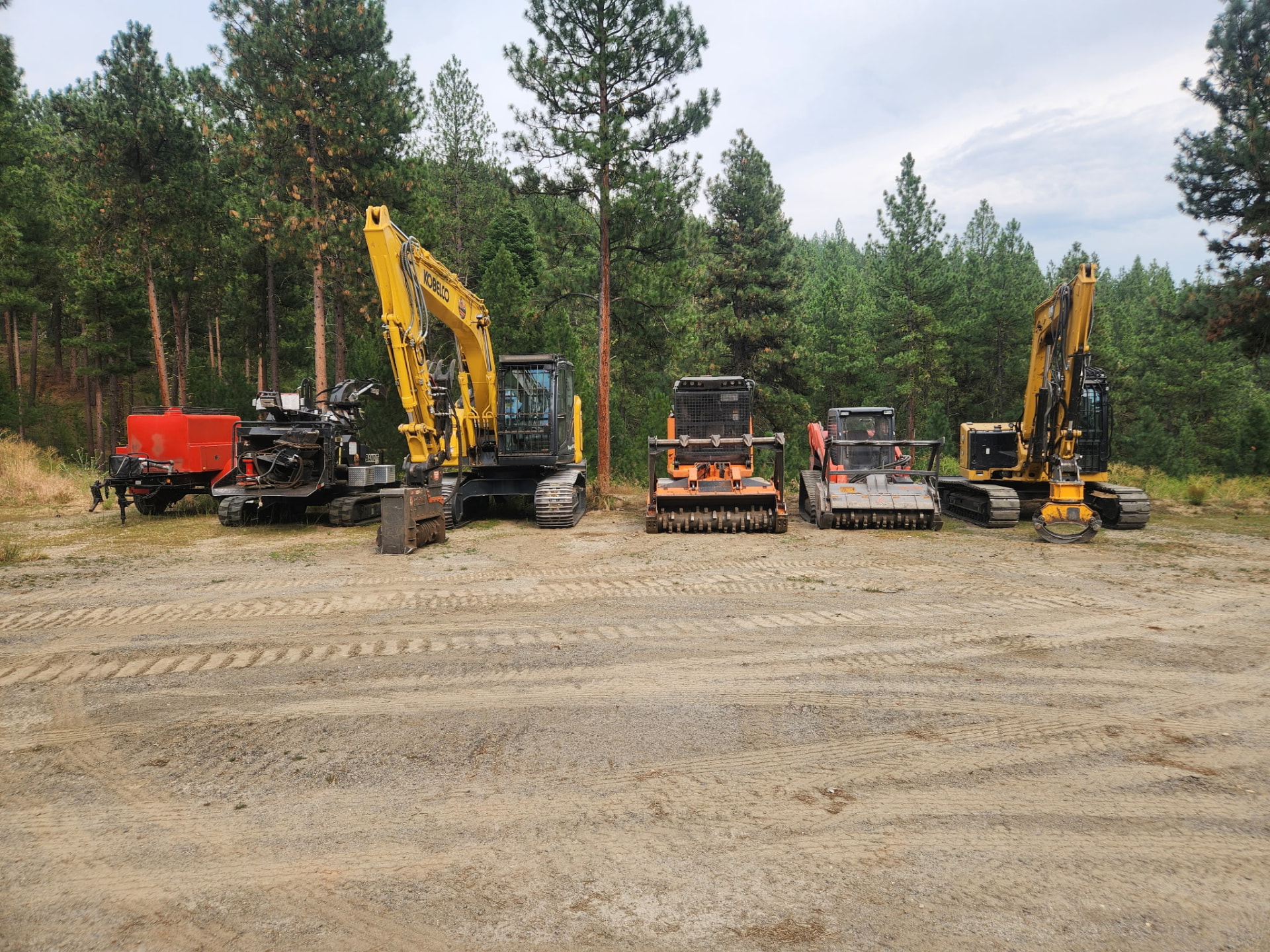 D&D Tree & Land Management equipment lineup including excavators and mulching machines